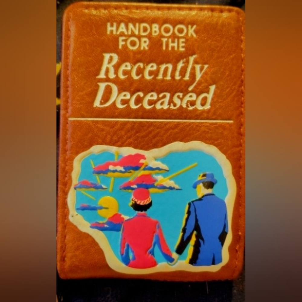 Brown Book with Colorful Cover Art